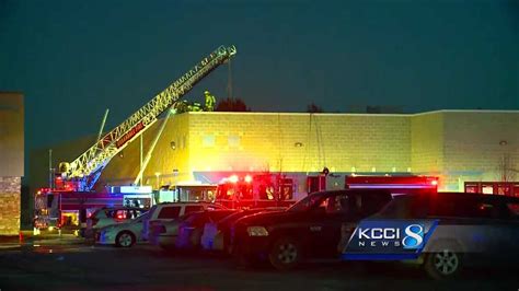 Evacuated theater troupe performing in parking