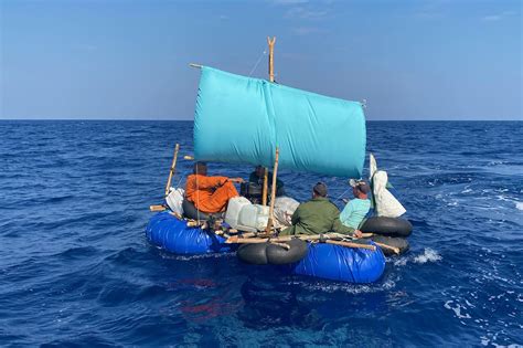 Refugee raft transformed into backyard swing set