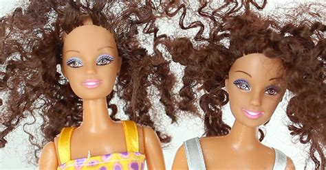 Spaghetti-haired Barbies sprawled across linoleum